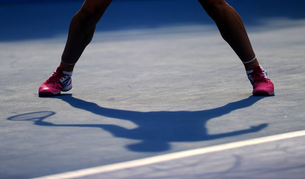 L’ombra della rumena Simona Halep durante l’incontro con la cinese Lin Zhu nel China Open di Tennis in corso a Pechino (Afp)